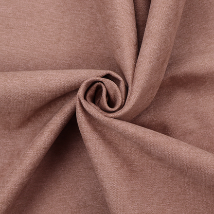 A solid muted pink or dusty rose woven textile with a fine, subtle textured weave.