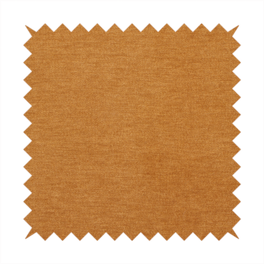 A solid orange or mustard yellow woven textile with a fine, subtle textured weave.