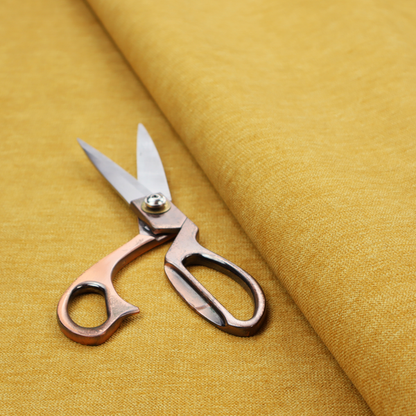 A solid mustard yellow woven textile with a fine, subtle textured weave.