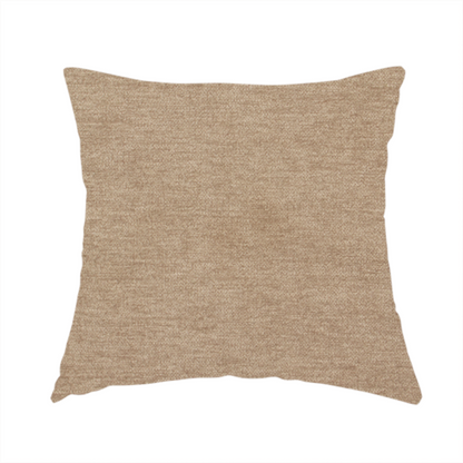 The fabric used to create this handmade cushion is a solid light brown or taupe woven textile with a fine, subtle textured weave.