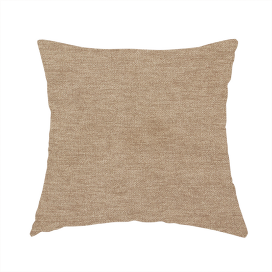 The fabric used to create this handmade cushion is a solid light brown or taupe woven textile with a fine, subtle textured weave.
