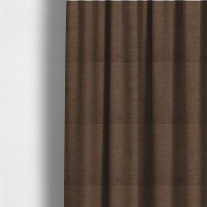 the fabric used to create these made-to-measure curtains is a solid dark brown woven fabric swatch with a fine, subtle texture.