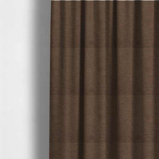 the fabric used to create these made-to-measure curtains is a solid dark brown woven fabric swatch with a fine, subtle texture.