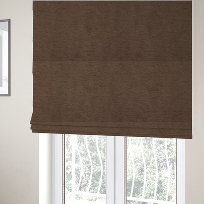 The fabric used to create these Roman blinds is a solid dark brown woven fabric swatch with a fine, subtle texture.