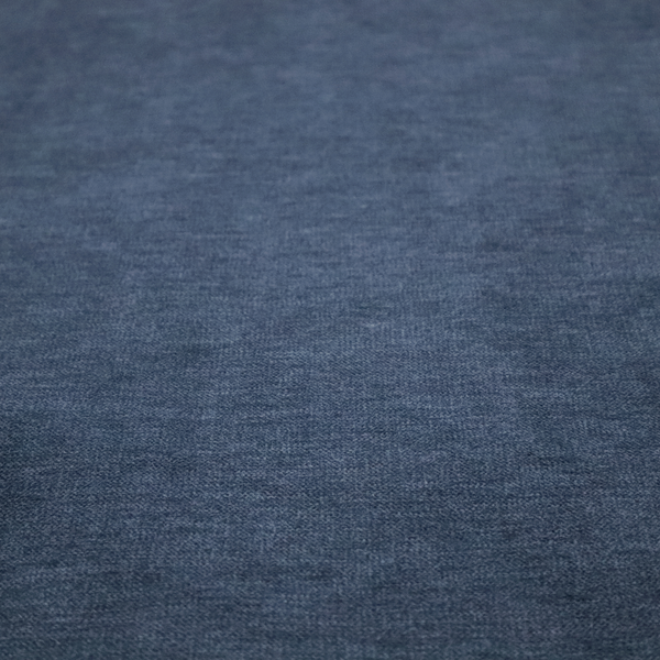 A solid blue woven textile with a fine, subtle textured weave.
