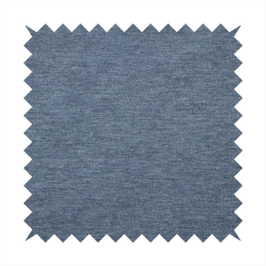 A solid light blue or steel blue woven textile with a fine, subtle textured weave.