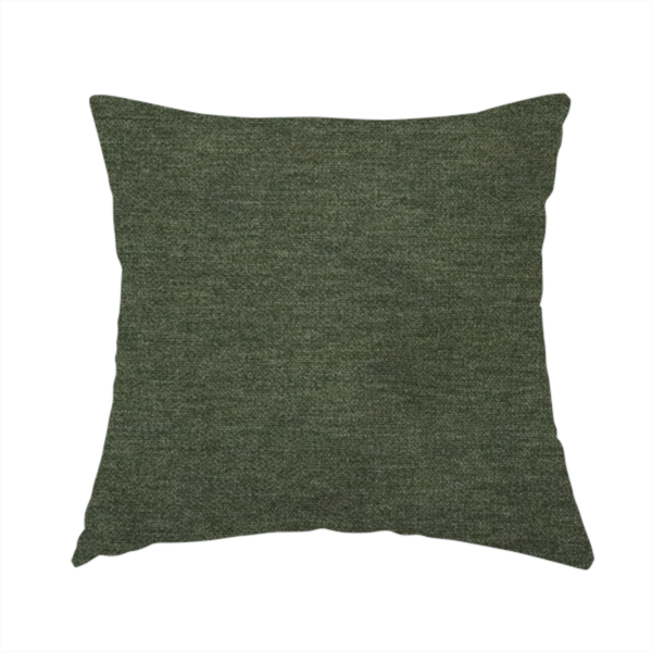 The fabric used to create this handmade cushion is a solid dark green woven fabric swatch with a fine, subtle texture.