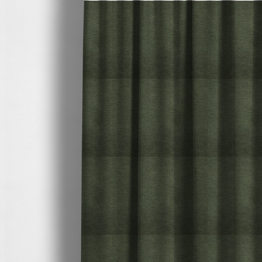 The fabric used to create these made-to-measure curtains is a solid dark green woven fabric swatch with a fine, subtle texture.