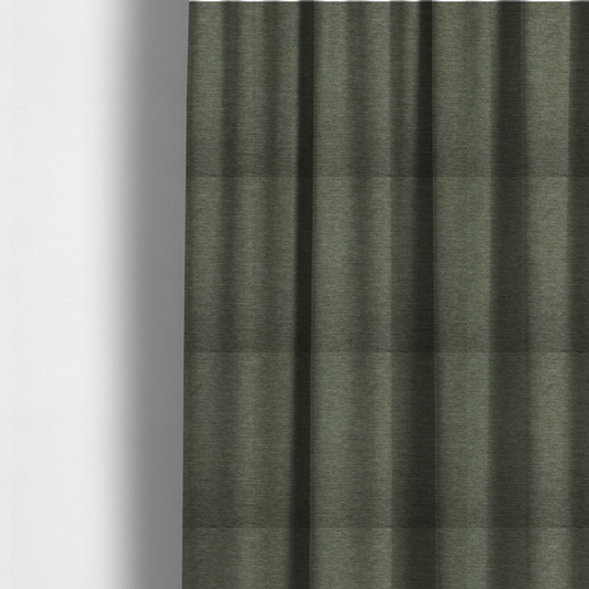The fabric used to create these made-to-measure curtains is a solid sage green woven fabric swatch with a fine, subtle texture.
