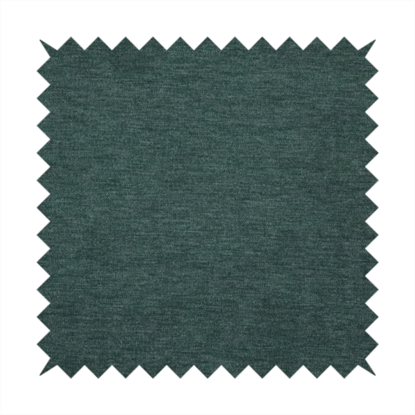 A solid teal or deep turquoise woven textile with a fine, subtle textured weave.