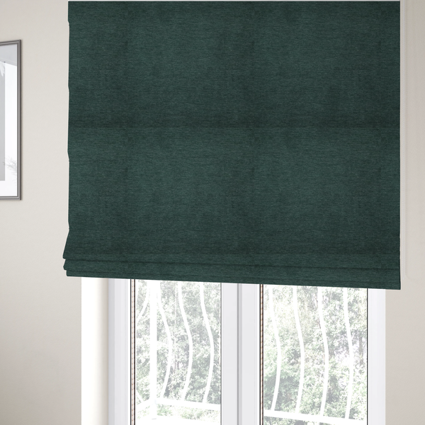 the fabric used to create these Roman blinds is a solid teal or deep turquoise woven textile with a fine, subtle textured weave.