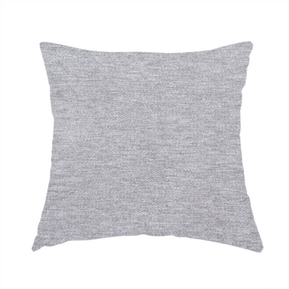 The fabric used to create this handmade cushion is a medium grey or silver-grey woven textile with a fine, subtle textured weave.
