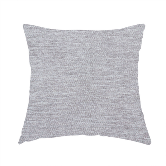 The fabric used to create this handmade cushion is a medium grey or silver-grey woven textile with a fine, subtle textured weave.