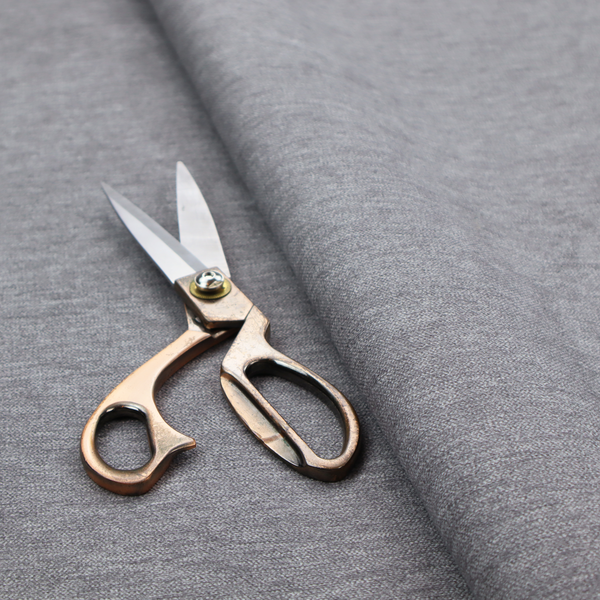 A solid dark grey or charcoal woven textile with a fine, subtle textured weave.