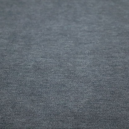 A solid dark denim blue or slate blue woven textile with a fine, subtle textured weave.