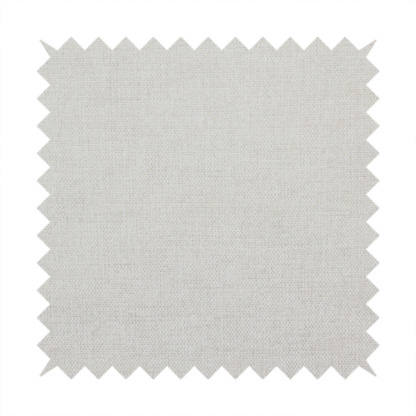 A textured, light beige or cream-coloured woven upholstery fabric.