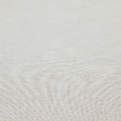 A textured, light beige or cream-coloured woven upholstery fabric.
