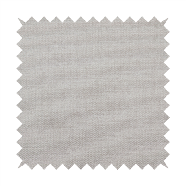 A textured, light taupe or greyish-beige woven upholstery fabric.