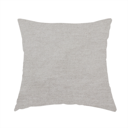 the fabric used to create this handmade cushion is a textured, light taupe or greyish-beige woven upholstery fabric.