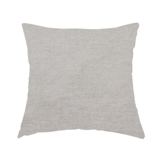 the fabric used to create this handmade cushion is a textured, light taupe or greyish-beige woven upholstery fabric.