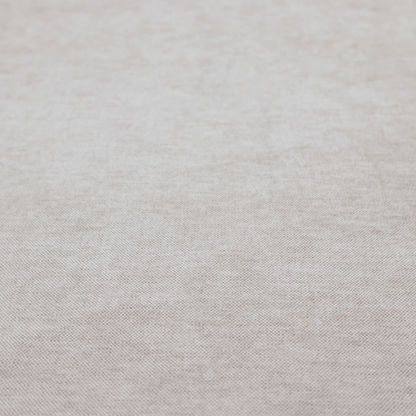 A textured, light taupe or greyish-beige woven upholstery fabric.