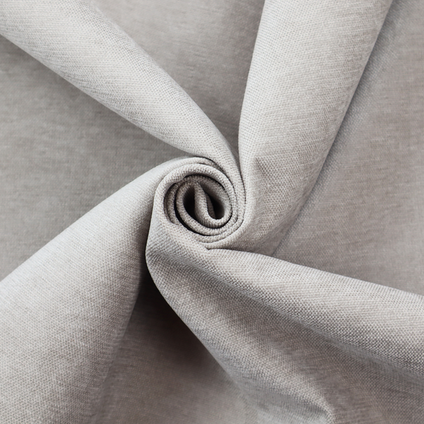 A textured, light taupe or greyish-beige woven upholstery fabric.