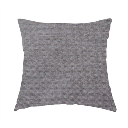 The fabric used to create this handmade cushion is a textured, medium grey woven upholstery fabric.