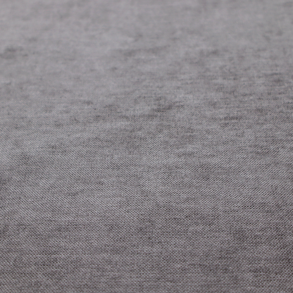 A textured, medium grey woven upholstery fabric.