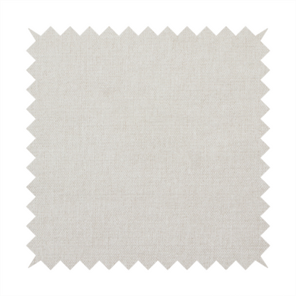 A textured, light beige woven upholstery fabric.