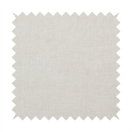 A textured, light beige woven upholstery fabric.
