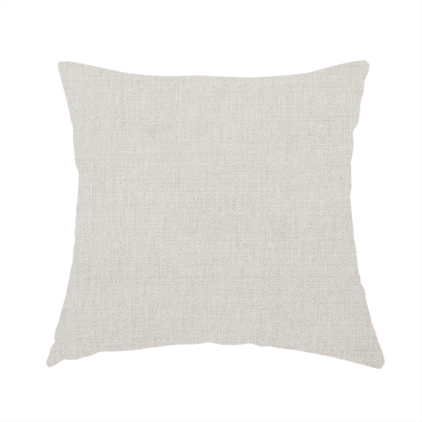 The fabric used to create this handmade cushion is a textured, light beige woven upholstery fabric.