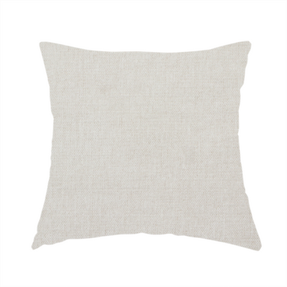 The fabric used to create this handmade cushion is a textured, light beige woven upholstery fabric.
