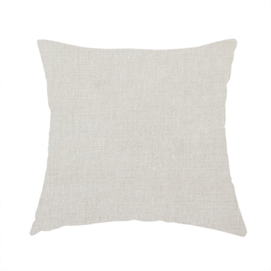 The fabric used to create this handmade cushion is a textured, light beige woven upholstery fabric.
