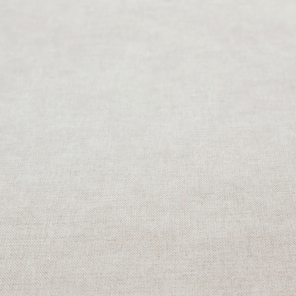 A textured, light beige woven upholstery fabric.