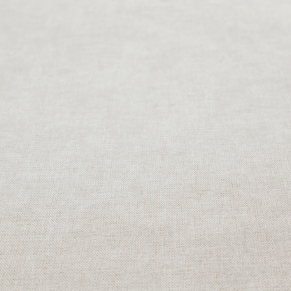 A textured, light beige woven upholstery fabric.
