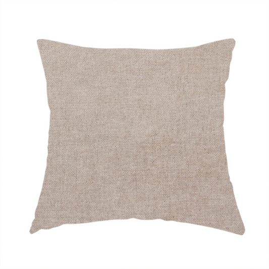 The fabric used to create this handmade cushion is a textured, warm taupe or tan woven upholstery fabric.
