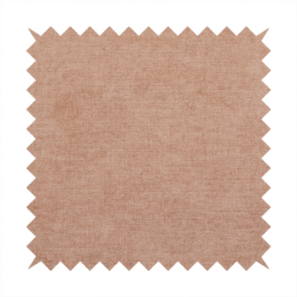 A textured, warm peach or terracotta-coloured woven upholstery fabric.