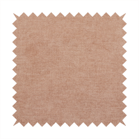 A textured, warm peach or terracotta-coloured woven upholstery fabric.