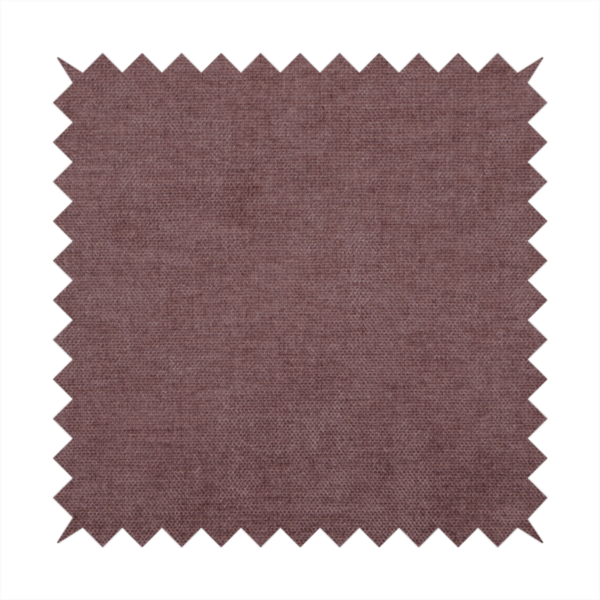 A textured, dusty mauve or muted purple woven upholstery fabric.