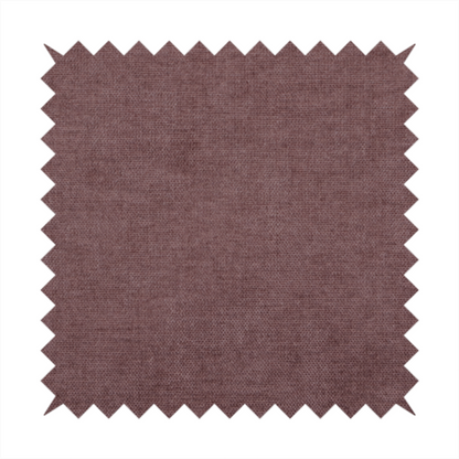 A textured, dusty mauve or muted purple woven upholstery fabric.