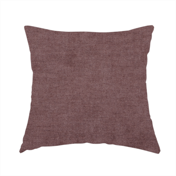 The fabric used to create this handmade cushion is a textured, dusty mauve or muted purple woven upholstery fabric.