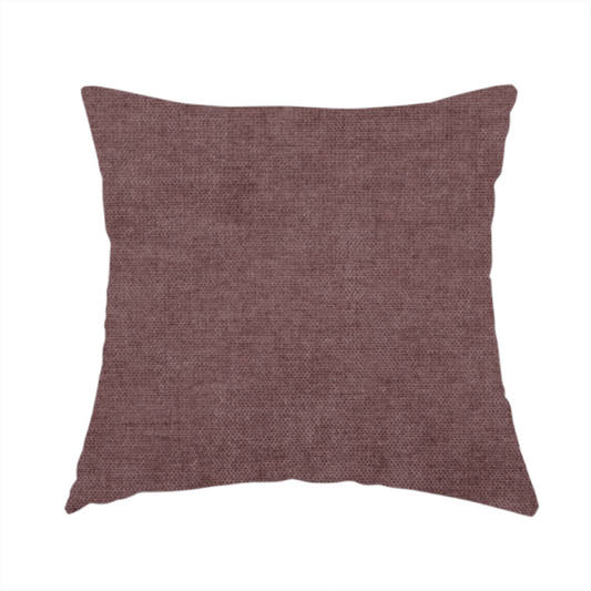 The fabric used to create this handmade cushion is a textured, dusty mauve or muted purple woven upholstery fabric.