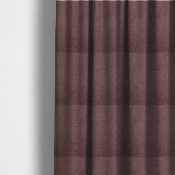 The fabric used to create these made-to-measure curtains is a textured, dusty mauve or muted purple woven upholstery fabric.