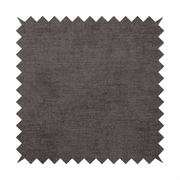 A textured, dark charcoal grey or brown-grey woven upholstery fabric.