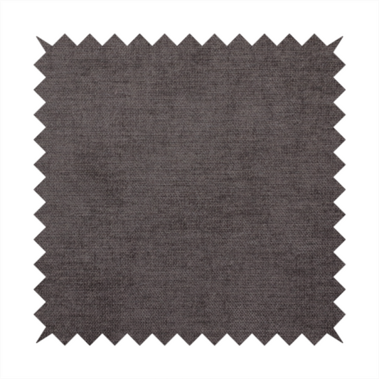 A textured, dark charcoal grey or brown-grey woven upholstery fabric.