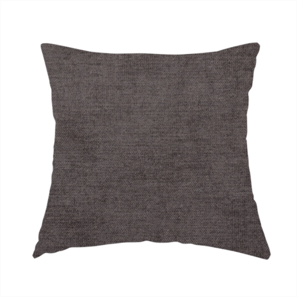 The fabric used to create this handmade cushion is a textured, dark charcoal grey or brown-grey woven upholstery fabric.