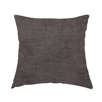 The fabric used to create this handmade cushion is a textured, dark charcoal grey or brown-grey woven upholstery fabric.