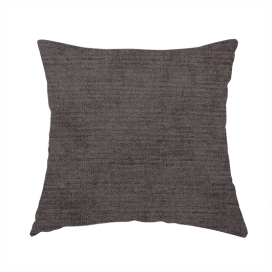 The fabric used to create this handmade cushion is a textured, dark charcoal grey or brown-grey woven upholstery fabric.