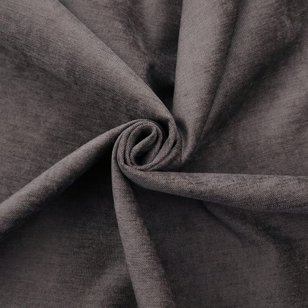 A textured, dark charcoal grey or brown-grey woven upholstery fabric.