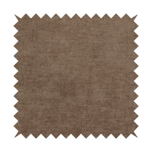 A textured, medium brown or bronze woven upholstery fabric.